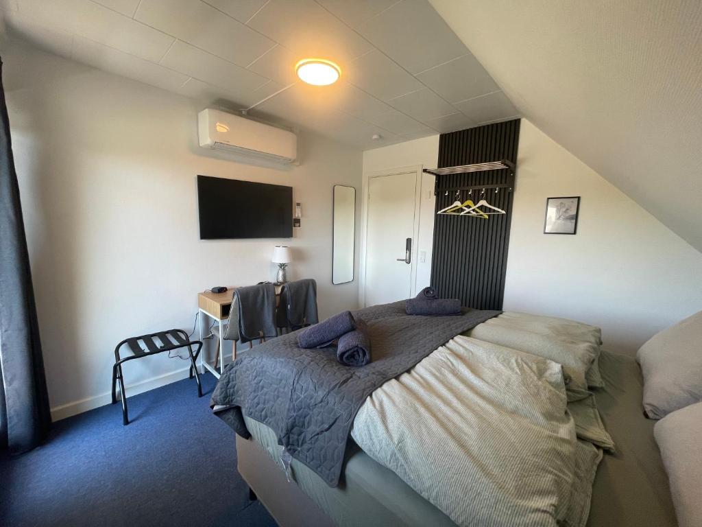 Postel nebo postele na pokoji v ubytování Marielyst Guesthouse