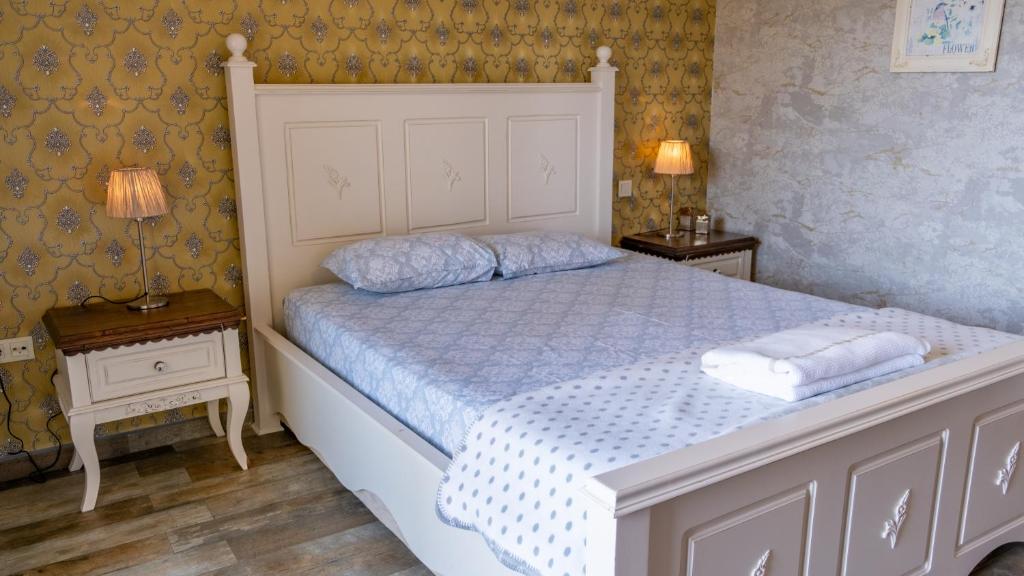 Postel nebo postele na pokoji v ubytování Nilüfer Butik Otel