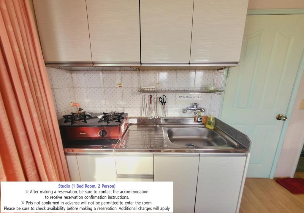 Kuchyň nebo kuchyňský kout v ubytování Seaside Minbak