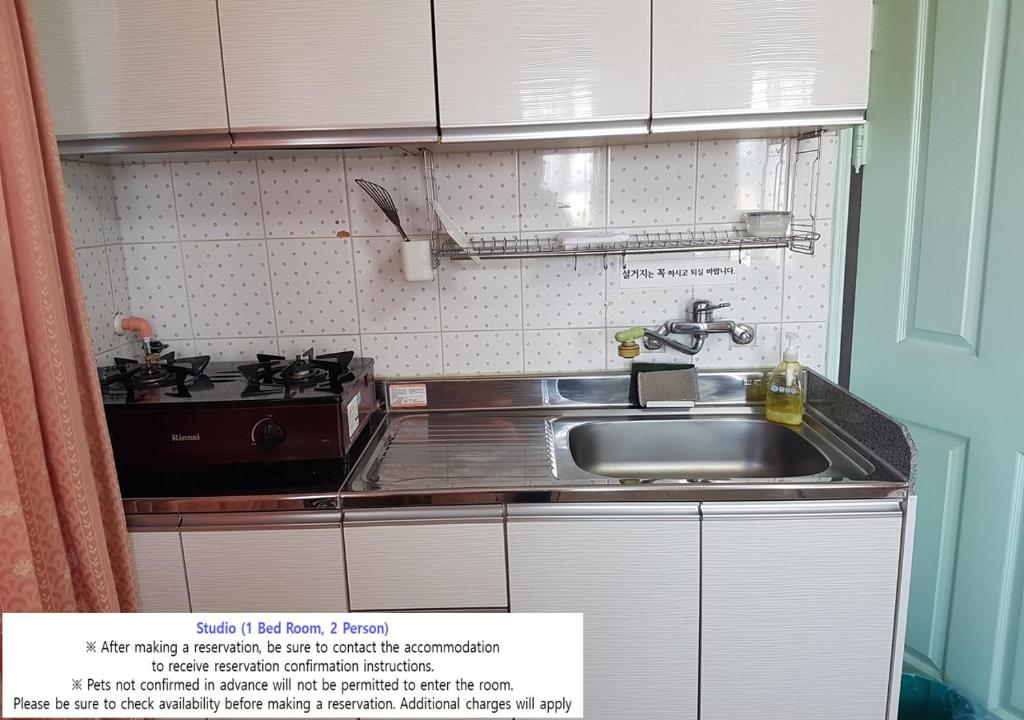 Kuchyň nebo kuchyňský kout v ubytování Seaside Minbak