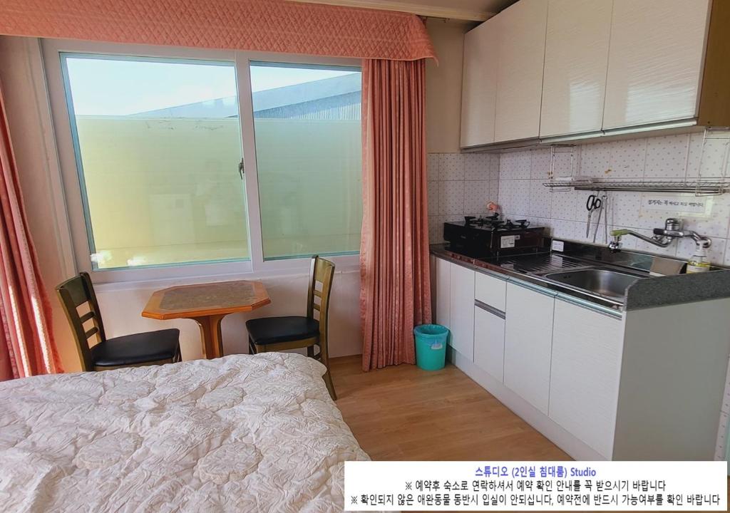 Kuchyň nebo kuchyňský kout v ubytování Seaside Minbak