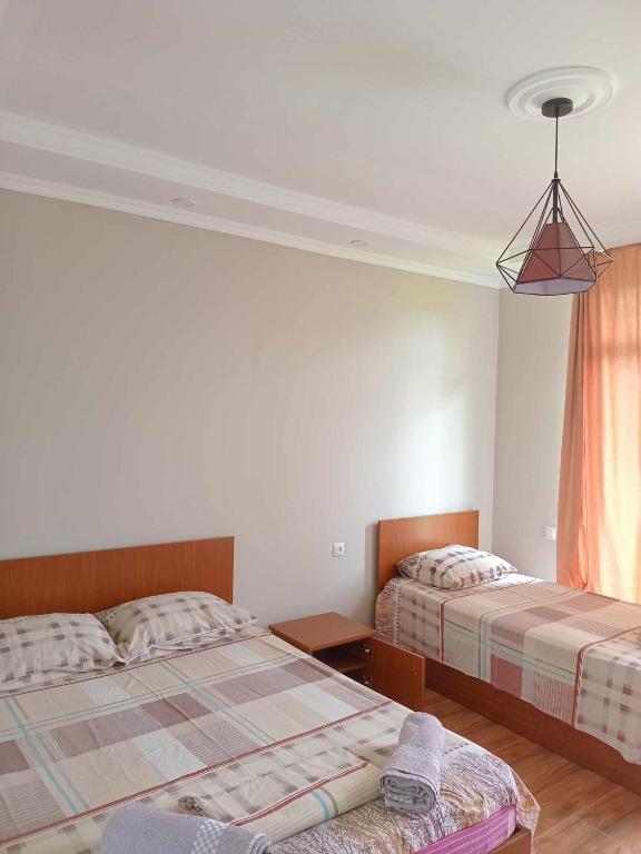 Postel nebo postele na pokoji v ubytování Guest house Gio