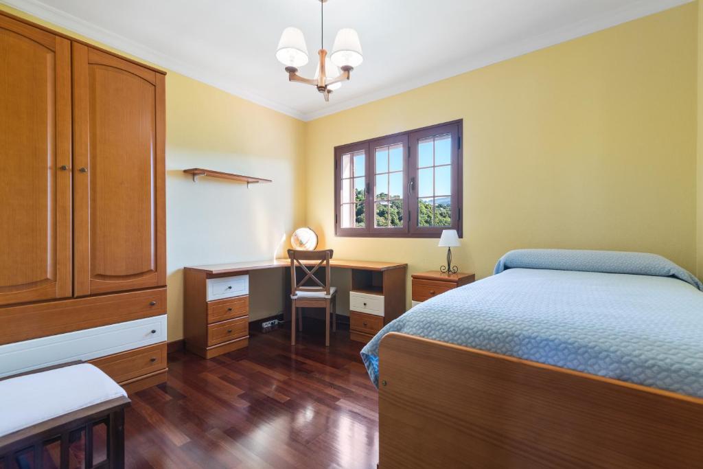 A bed or beds in a room at Villa Arrebol Azul
