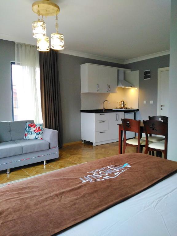 A kitchen or kitchenette at Anemo Suite
