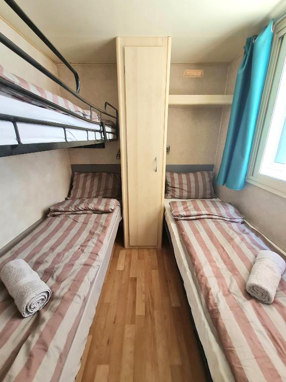 Postel nebo postele na pokoji v ubytování Tó Szálló