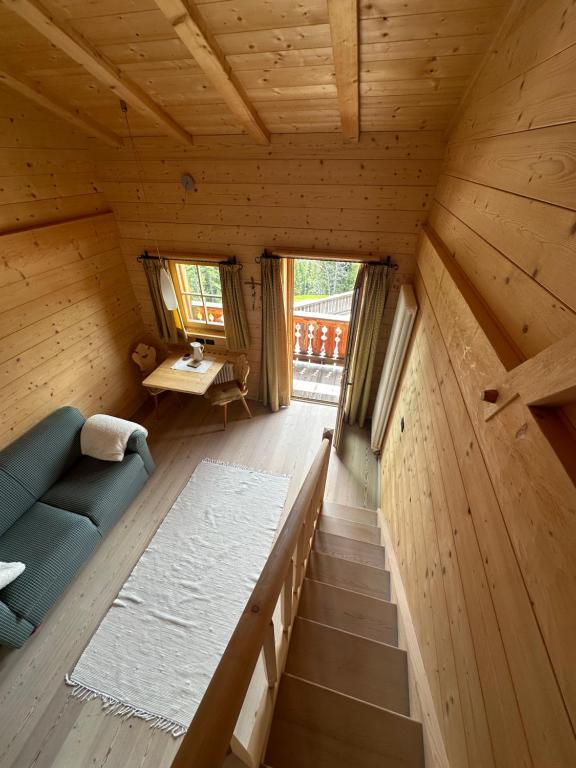 Postel nebo postele na pokoji v ubytování Chalet da mont Resciesa
