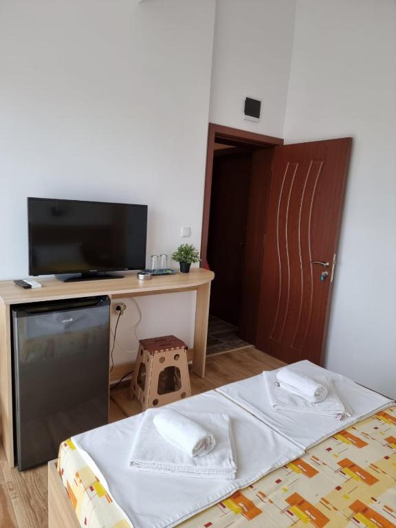 Postel nebo postele na pokoji v ubytování Vila Mihnevi