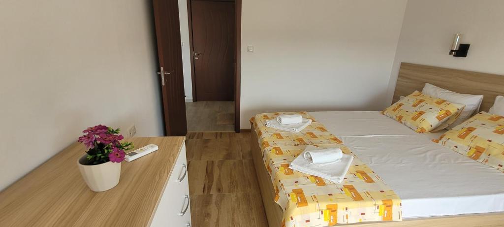 Postel nebo postele na pokoji v ubytování Vila Mihnevi