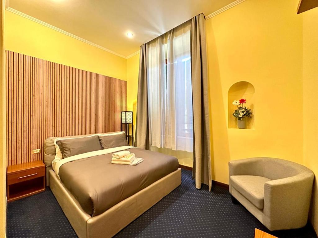 Postel nebo postele na pokoji v ubytování Hotel Rome place