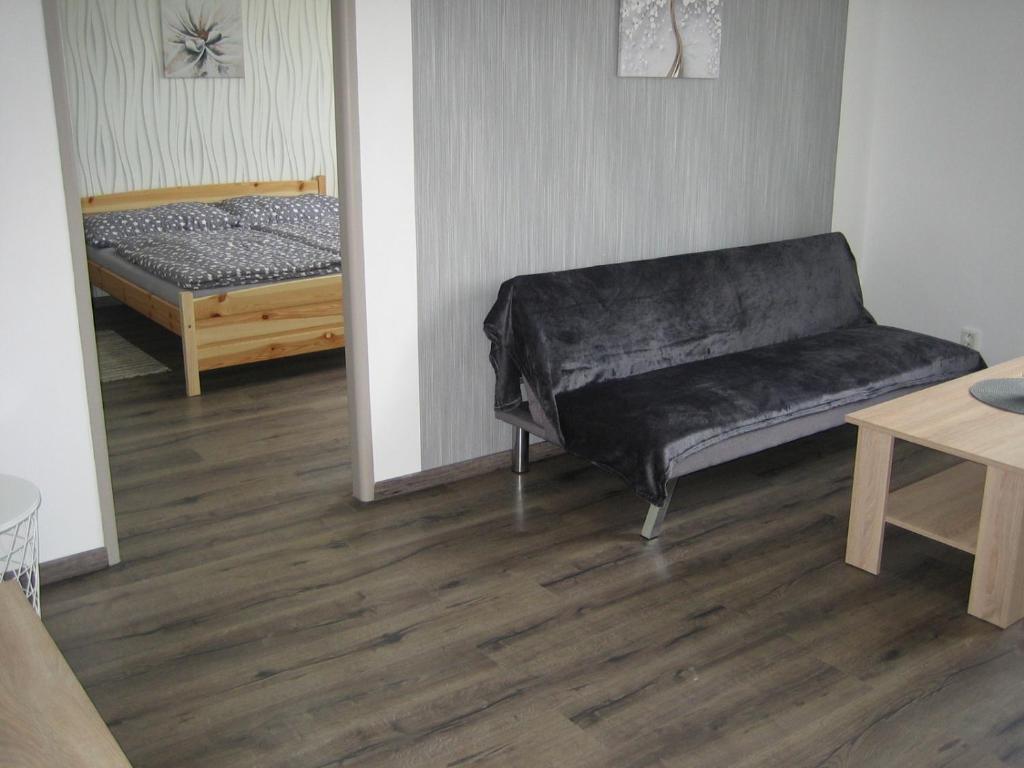 Postel nebo postele na pokoji v ubytování Apartmány Polepy