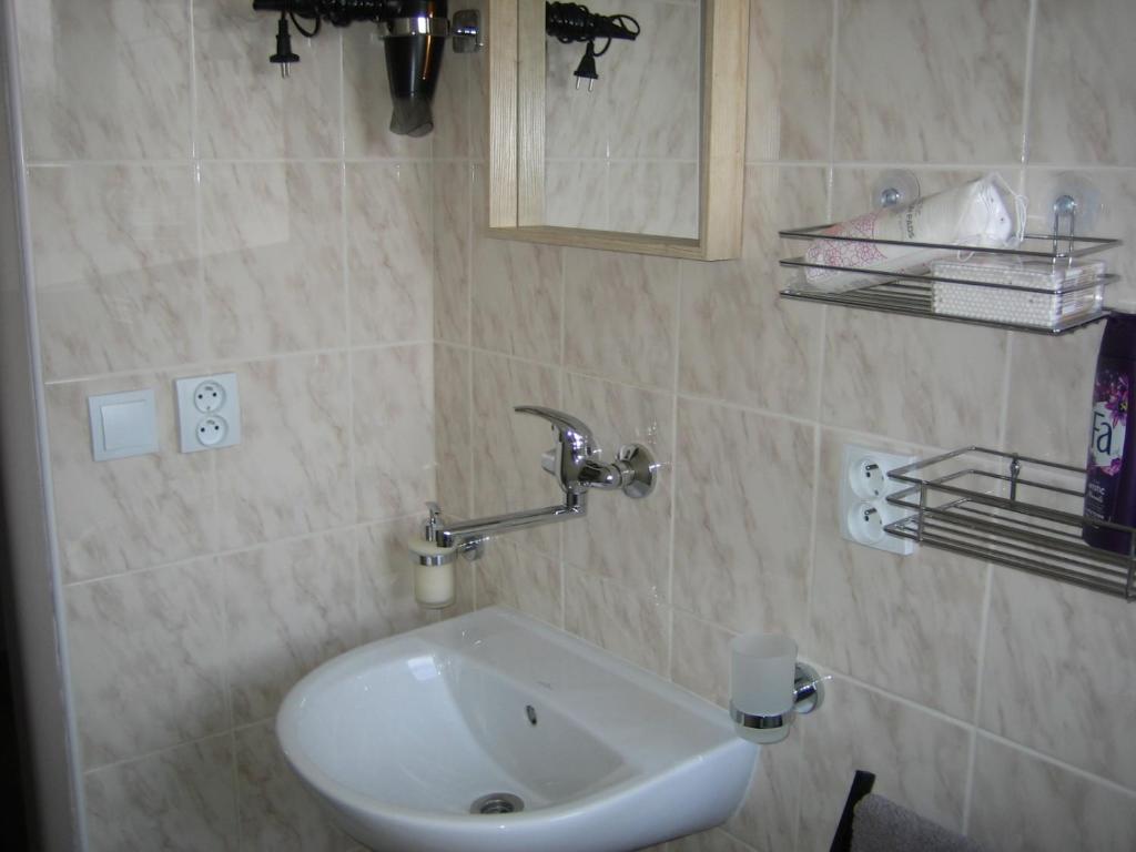 Koupelna v ubytování Apartmány Polepy