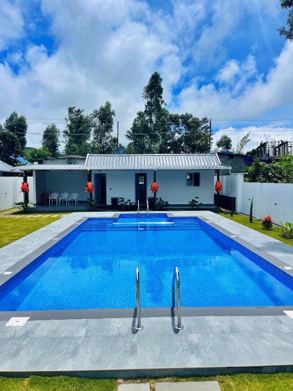 Bazén v ubytování The Windy Mist Resort Munnar nebo v jeho okolí