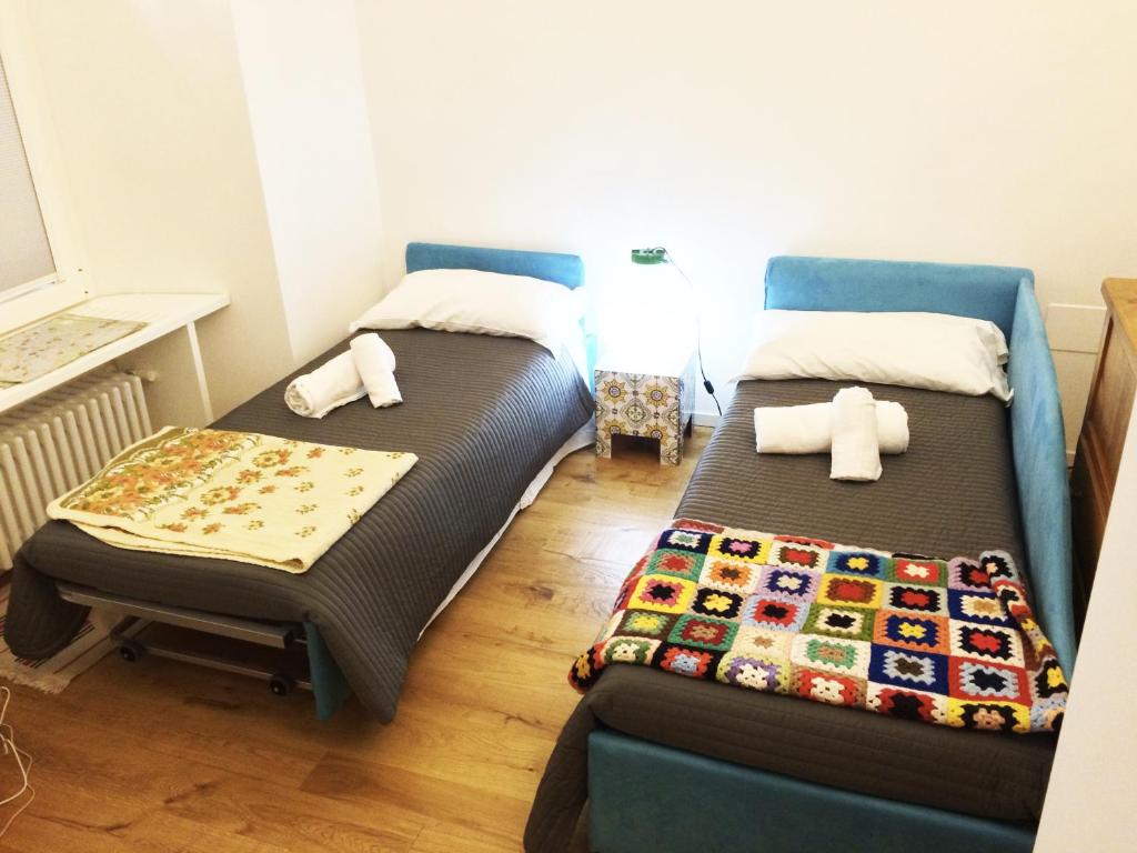 Posteľ alebo postele v izbe v ubytovaní CasaBlanca Apartment