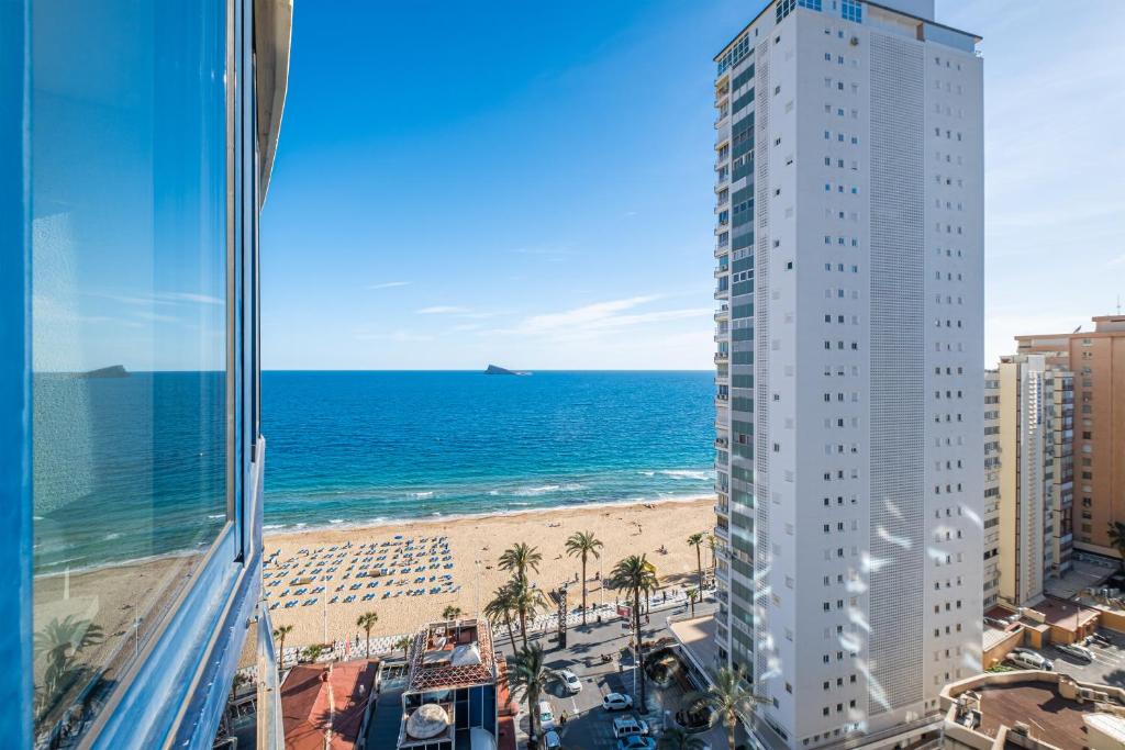 a view of the beach from a building at Acintur 13-A Apartment Levante Beach-Old Town in Benidorm