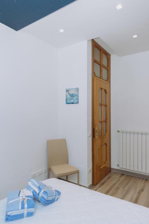 Postel nebo postele na pokoji v ubytování Modianus Suite