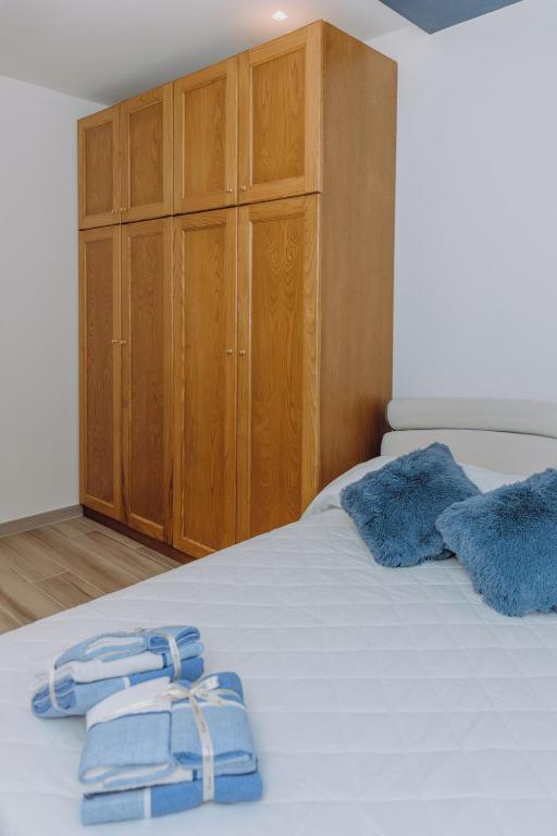 Postel nebo postele na pokoji v ubytování Modianus Suite