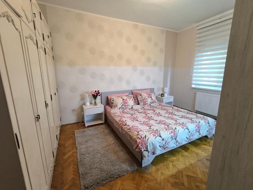 Postel nebo postele na pokoji v ubytování Apartman Braun Čačak