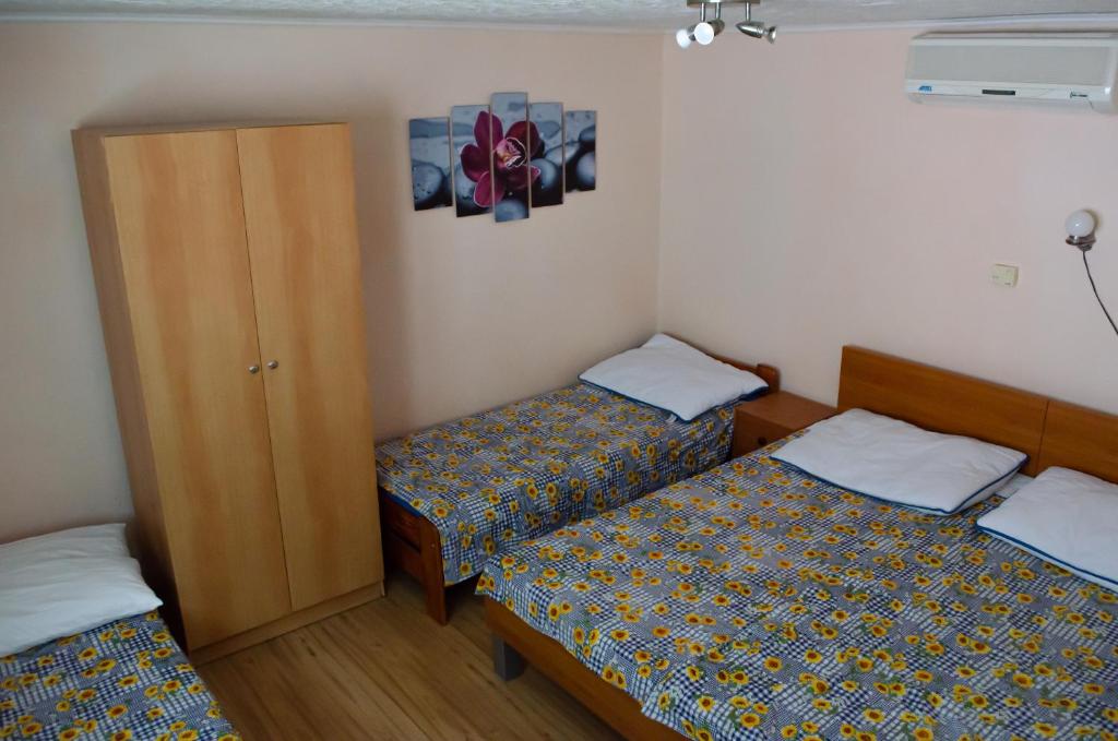 Postel nebo postele na pokoji v ubytování Apartmány u Jozefa