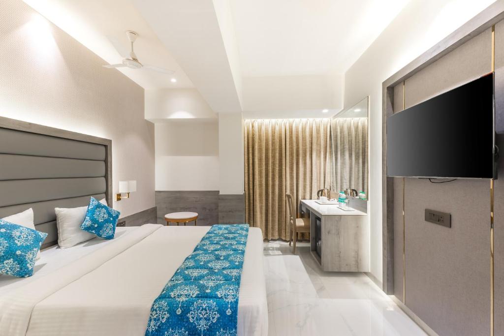 Postel nebo postele na pokoji v ubytování Hotel Supreme Comforts - Mumbai Airport