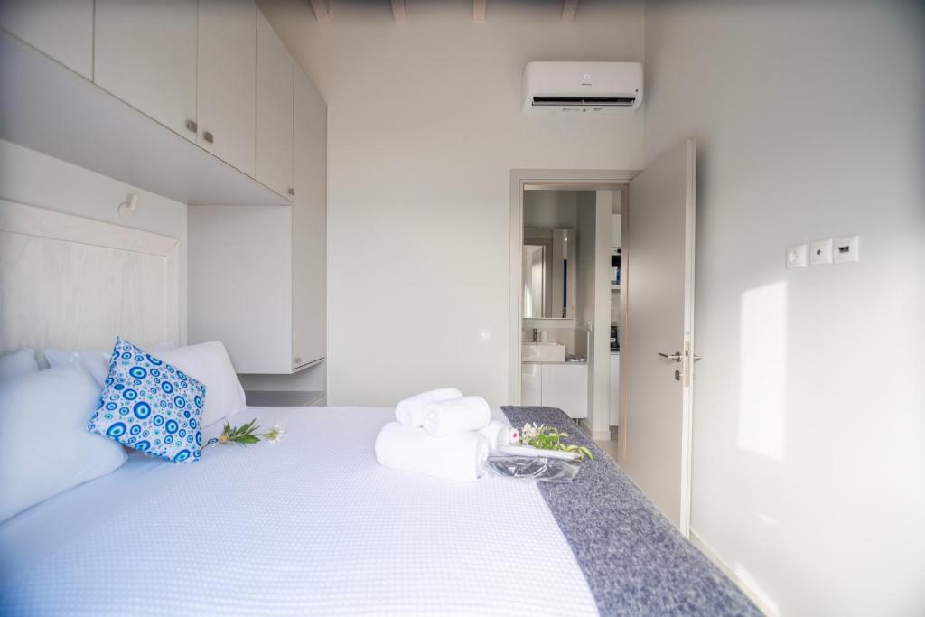 Postel nebo postele na pokoji v ubytování ONIRO Villas