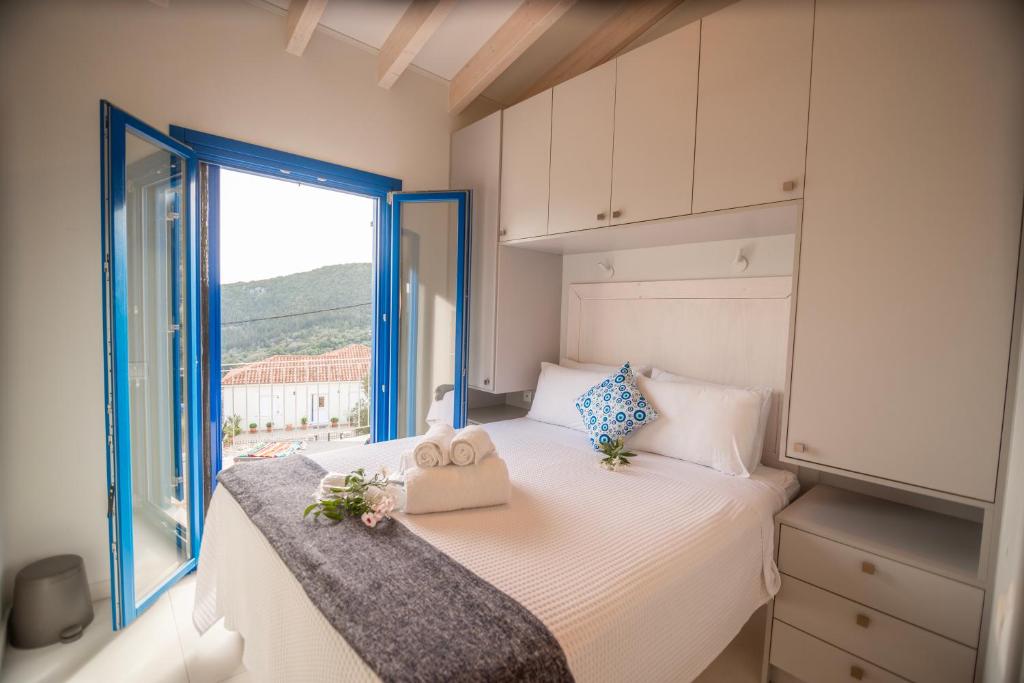 Postel nebo postele na pokoji v ubytování ONIRO Villas
