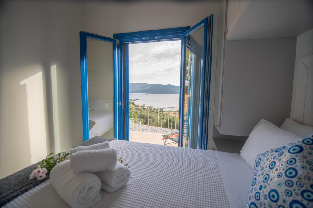 Postel nebo postele na pokoji v ubytování ONIRO Villas