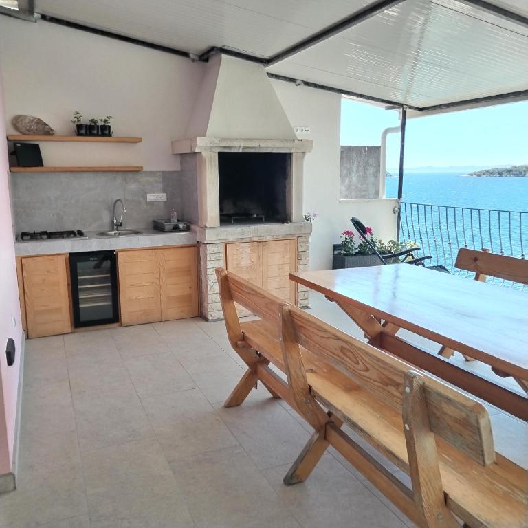 Kuchyň nebo kuchyňský kout v ubytování Apartman La Marija