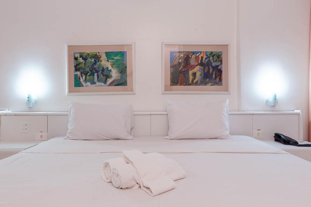 Cama ou camas em um quarto em Rede Andrade LG Inn