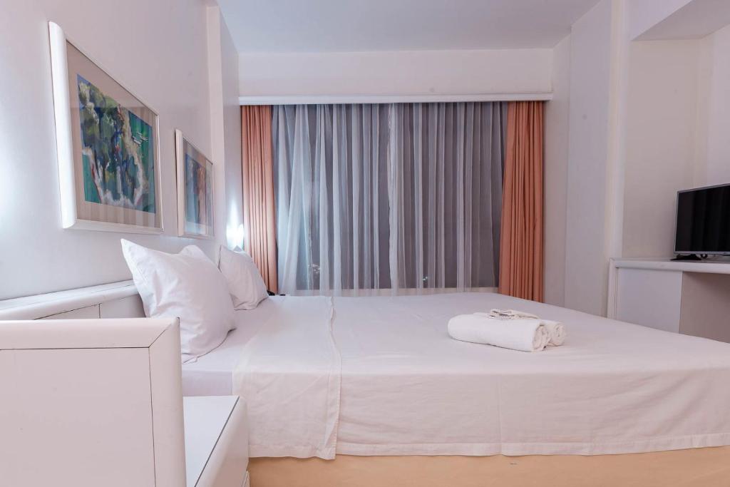 Cama ou camas em um quarto em Rede Andrade LG Inn