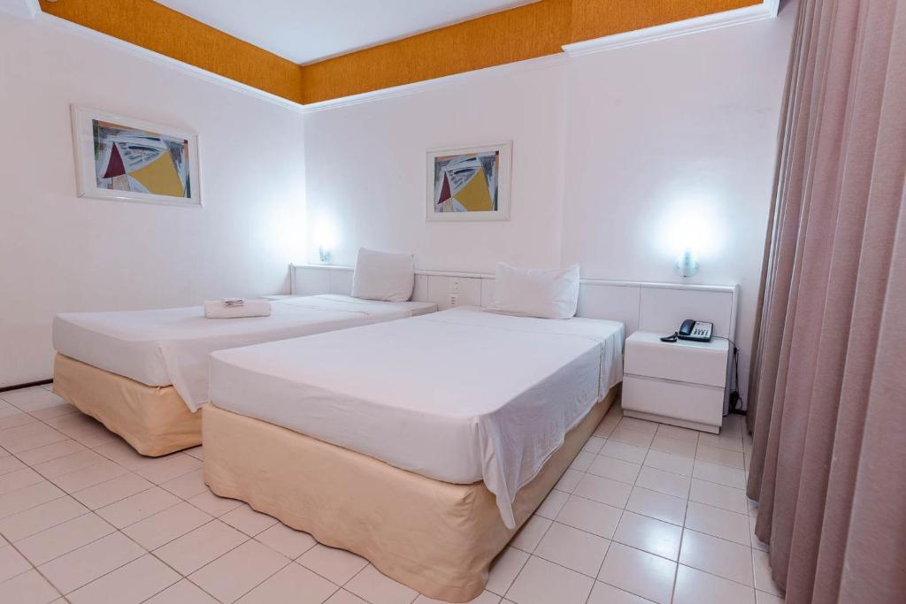 Cama ou camas em um quarto em Rede Andrade LG Inn