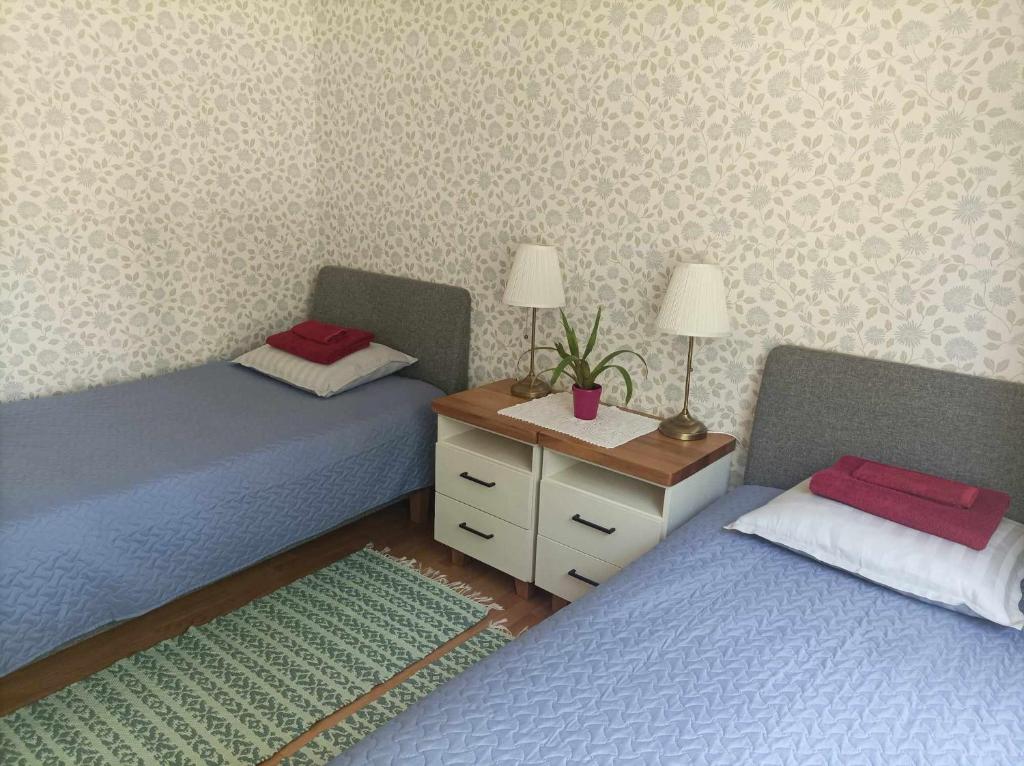 Voodi või voodid majutusasutuse Kärdla Vabaduse Holiday Apartment with Garden toas