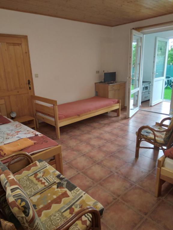 Postel nebo postele na pokoji v ubytování Penzion HORTENZIE