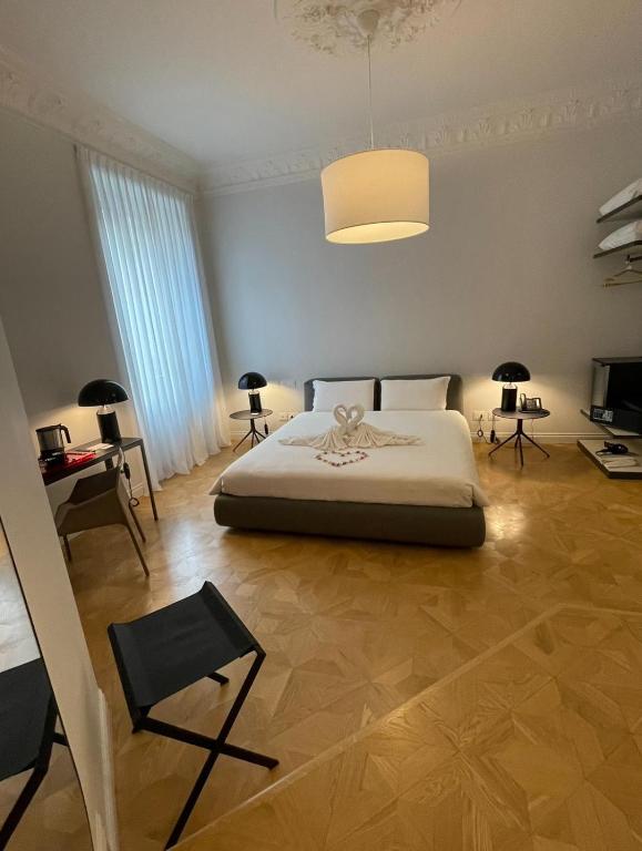 Postel nebo postele na pokoji v ubytování Delle Nazioni Milan Hotel