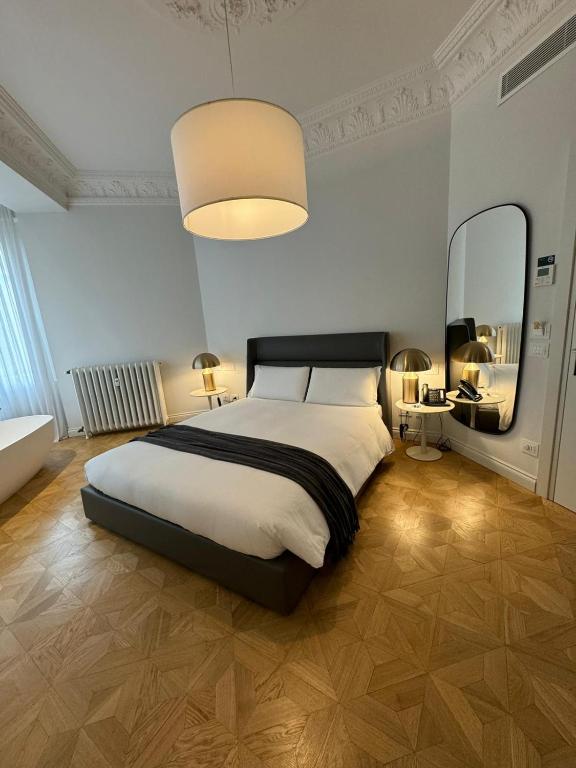 Postel nebo postele na pokoji v ubytování Delle Nazioni Milan Hotel