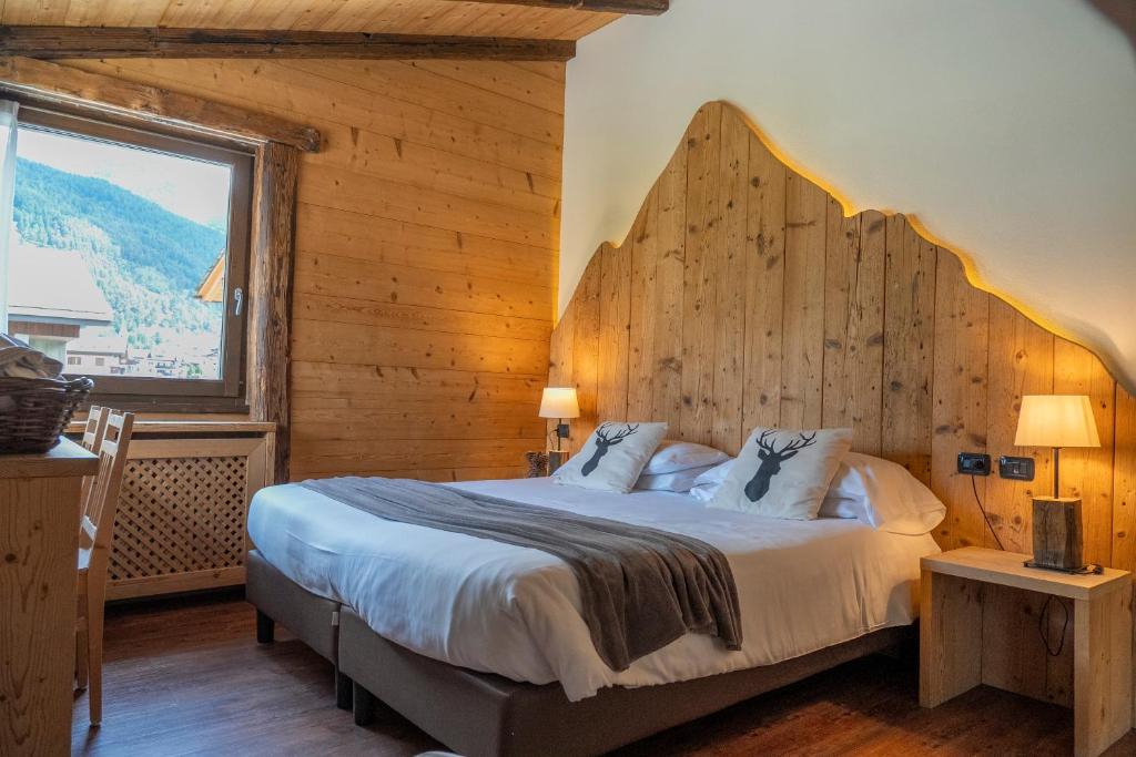 Łóżko lub łóżka w pokoju w obiekcie Hotel Nevada