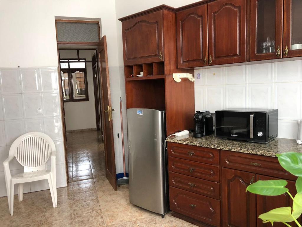 Kuchyň nebo kuchyňský kout v ubytování Tarrafal Ecodécor Rooms