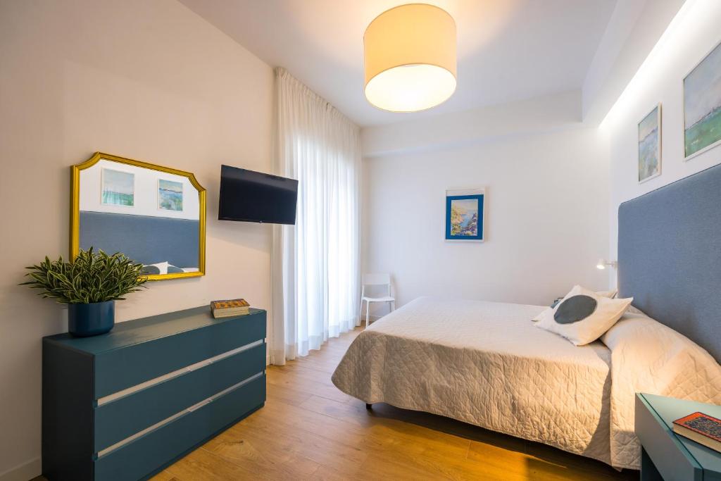 Postel nebo postele na pokoji v ubytování Le Terrazze di Santa Tecla