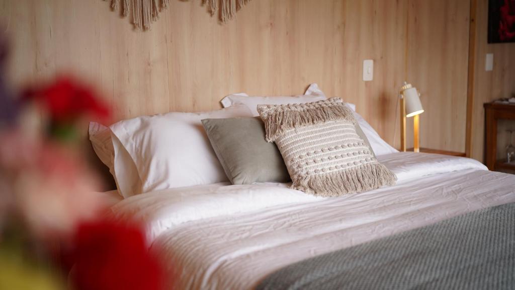 Postel nebo postele na pokoji v ubytování Santuario Glamping