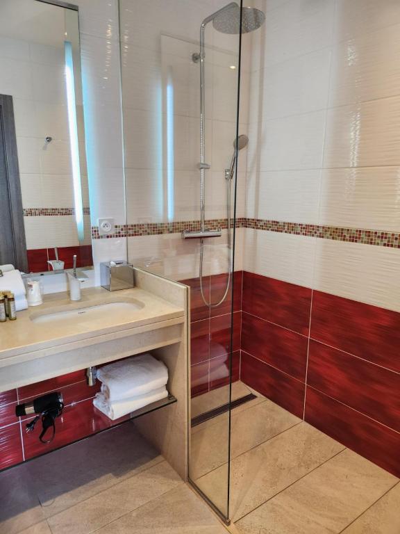 Koupelna v ubytování Kyriad Prestige Lyon Est - Saint Priest Eurexpo Hotel and SPA