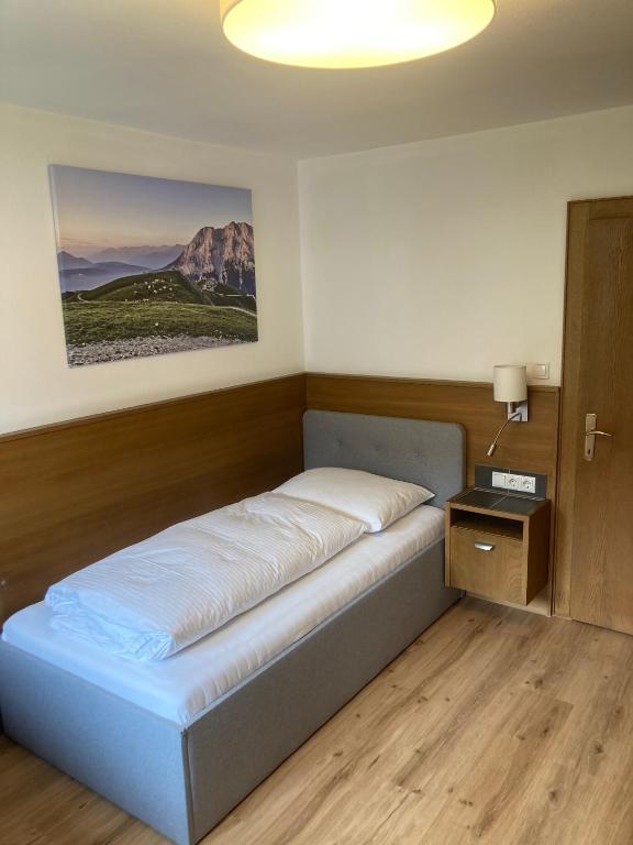 Postel nebo postele na pokoji v ubytování Hotel Egerthof