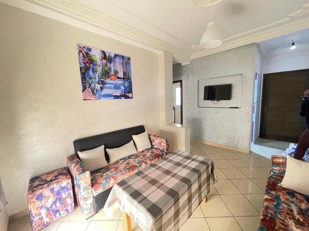 TV a/nebo společenská místnost v ubytování Oasis by Azur spacieux proche de la plage