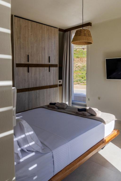 Letto o letti in una camera di The Aether Element Of Gaea