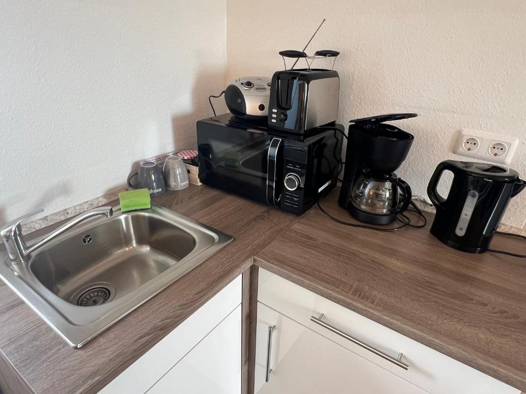Kuchyň nebo kuchyňský kout v ubytování Studio Apartment Frühauf Geithain