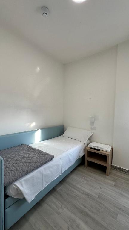 Postel nebo postele na pokoji v ubytování MARITTIMO Riccione - Hotel Clipper FRONTE MARE
