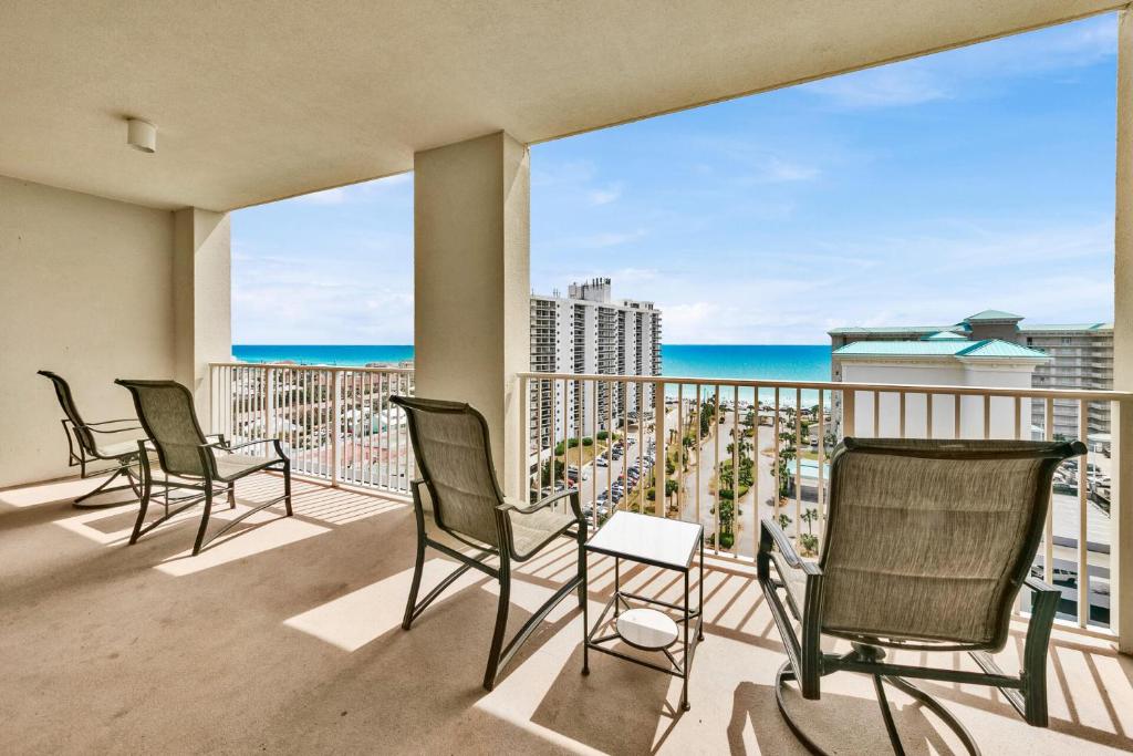 a balcony with chairs and a view of the ocean at Ariel Dunes I Unit 1209 Gulf view in Destin