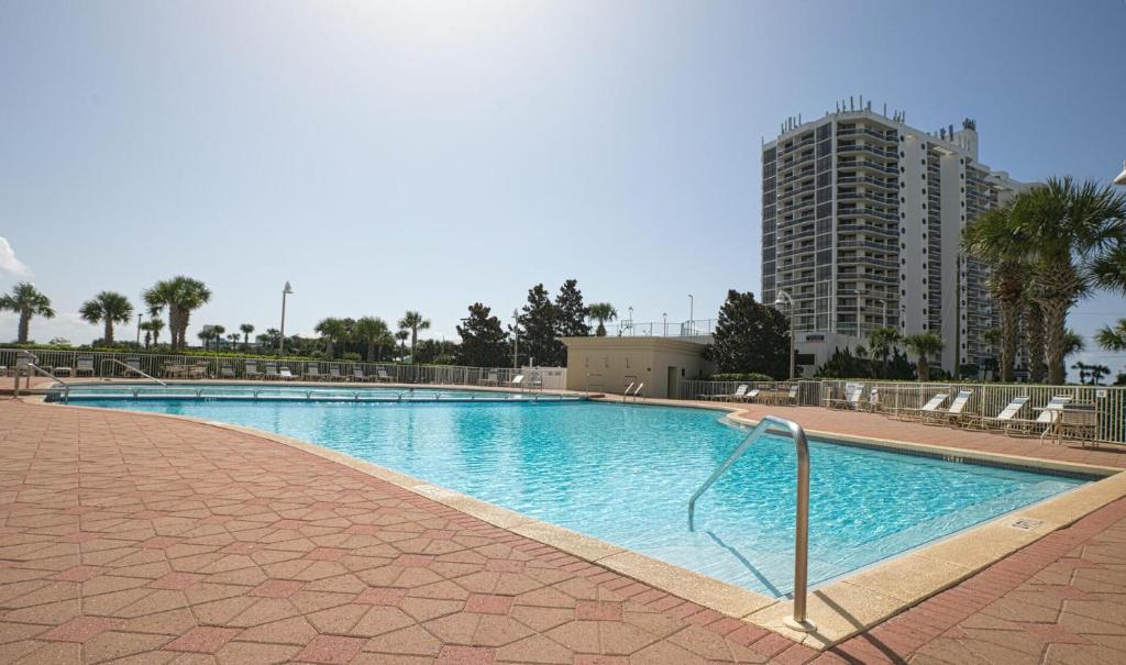 a large swimming pool with a building in the background at Ariel Dunes I Unit 1209 Gulf view in Destin