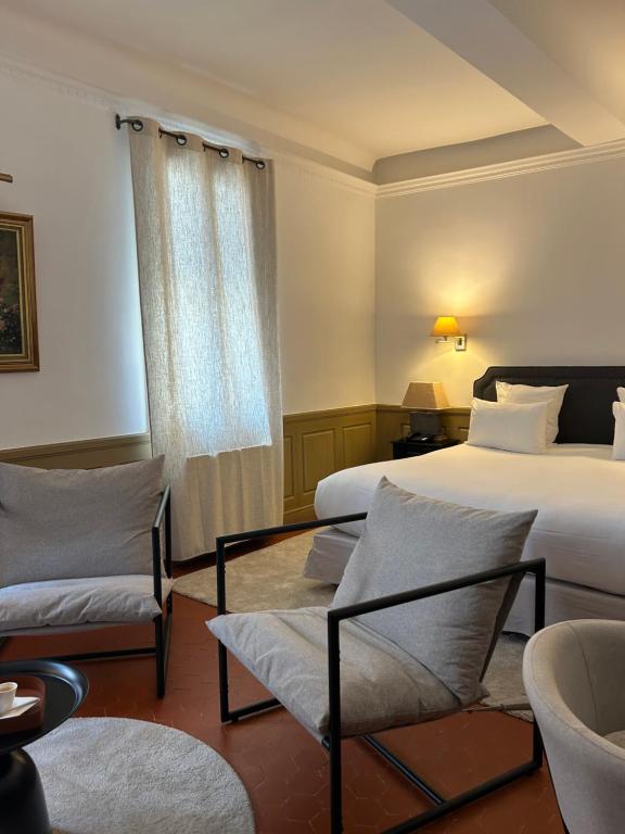 Postel nebo postele na pokoji v ubytování Maison Bérard Hôtel - Restaurant - Spa