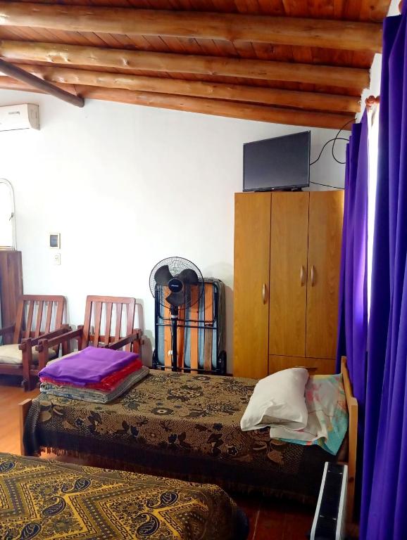 Postel nebo postele na pokoji v ubytování Alojamientos Lilu