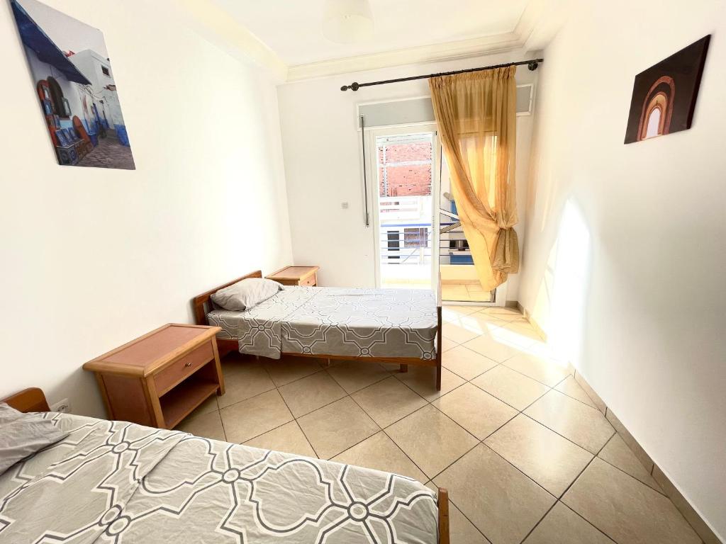 Postel nebo postele na pokoji v ubytování Azur by Azur spacieux, emplacement idéal et proche de la plage