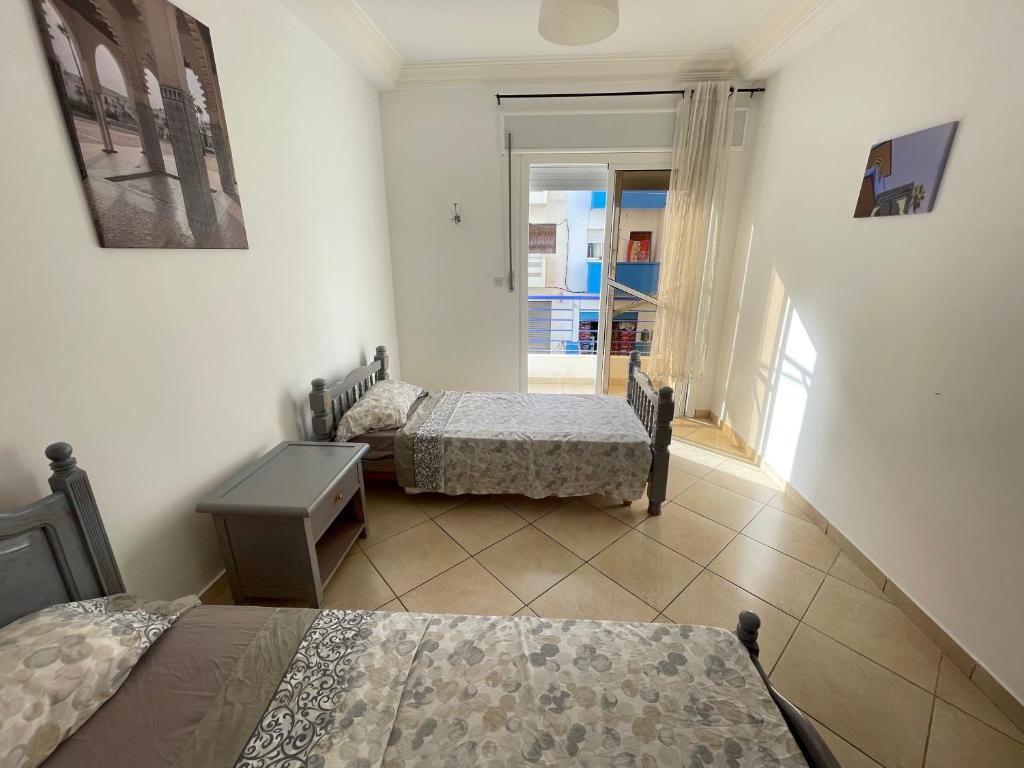 Postel nebo postele na pokoji v ubytování Azur by Azur spacieux, emplacement idéal et proche de la plage